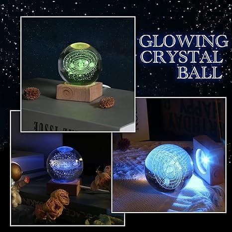 Glowing 3D crystal ball on a wooden stand with intricate internal designs.